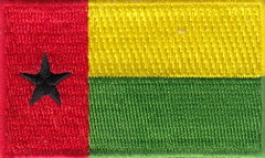 GUINEA-BISSAU TYGMÄRKE 65X38mm