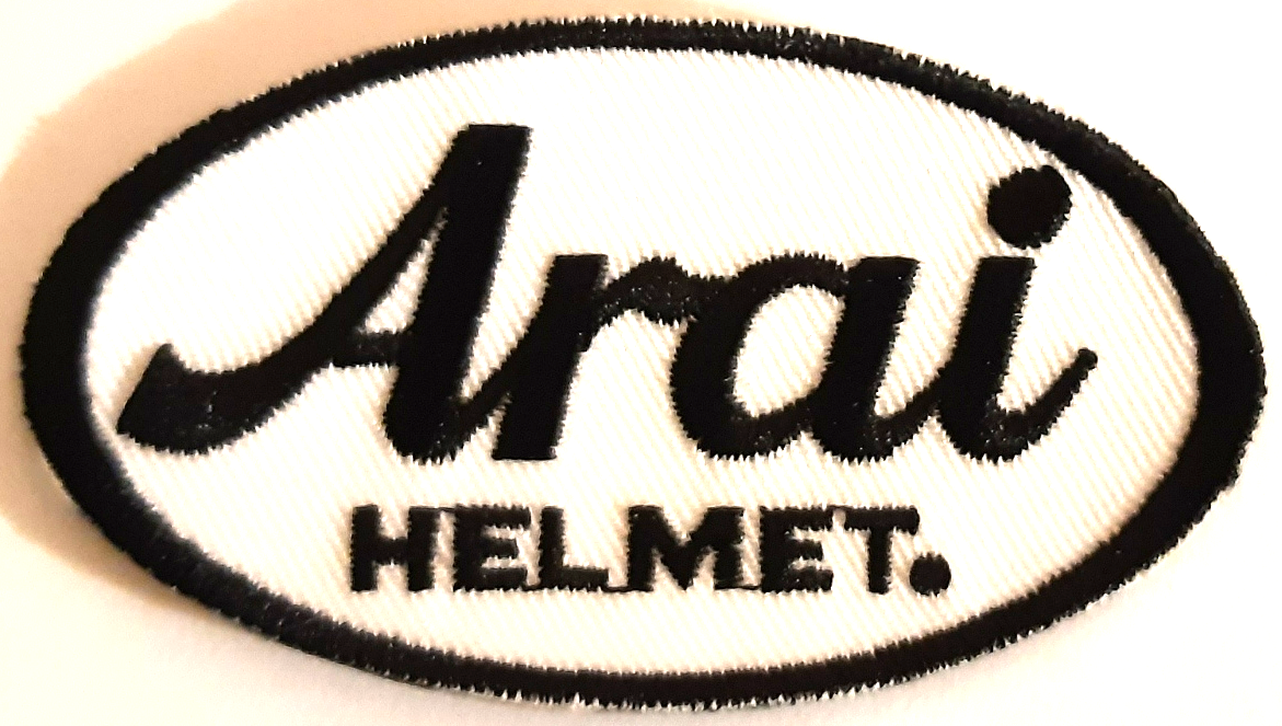 ARAI TYGMÄRKE 75x42mm