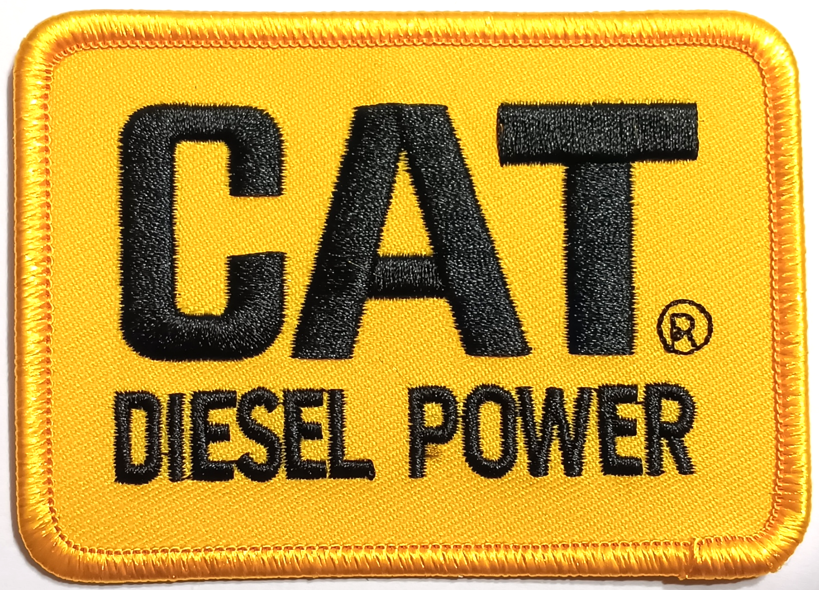 CAT DIESEL POWER TYGMÄRKE 88x65mm