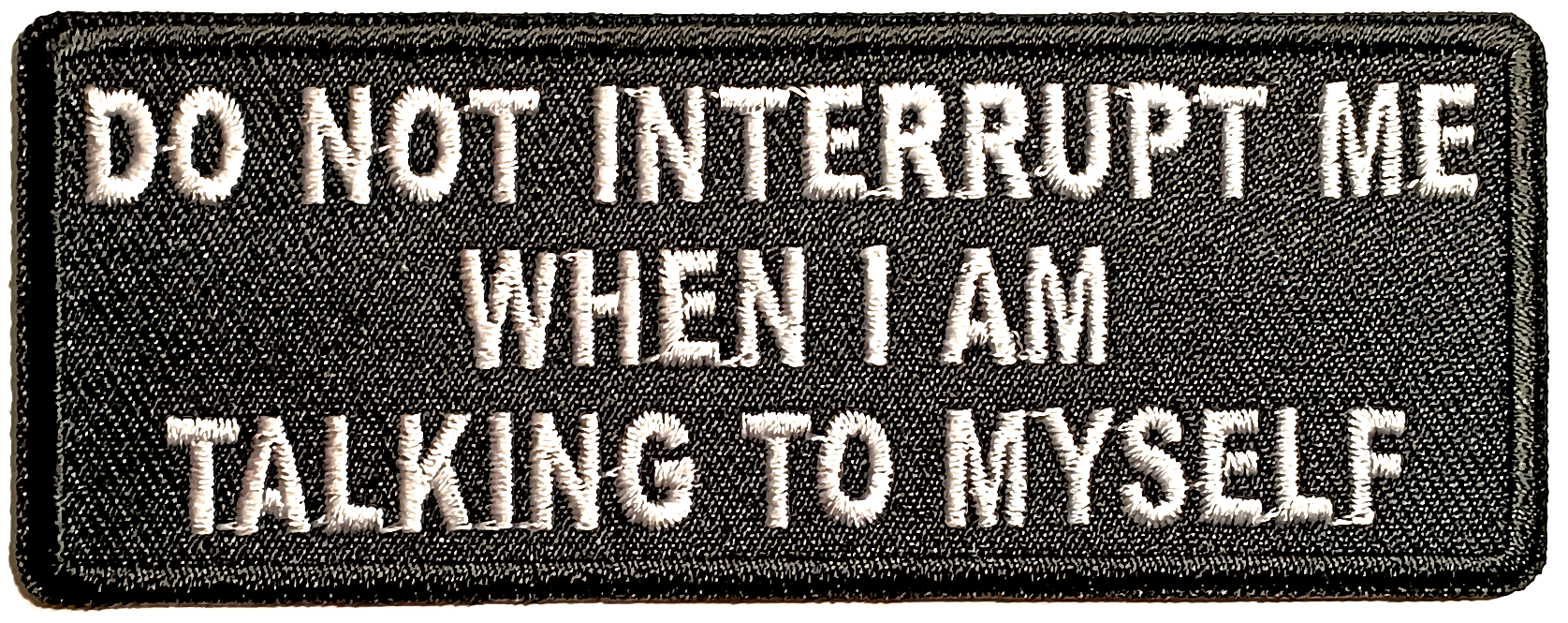 Do not interrupt me when... Tygmärke 102x40mm