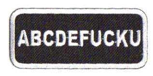 ABCDEFUCKU TYGMÄRKE 76x34mm