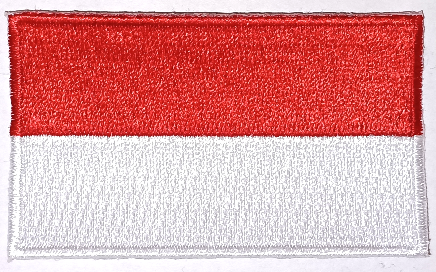 INDONESIEN TYGMÄRKE 65x38mm