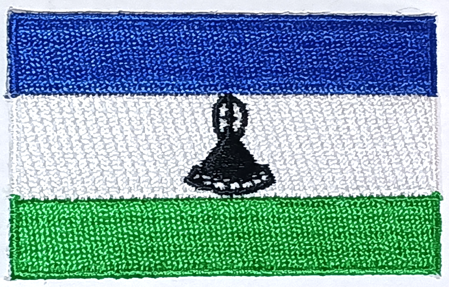 LESOTHO TYGMÄRKE 65x38mm