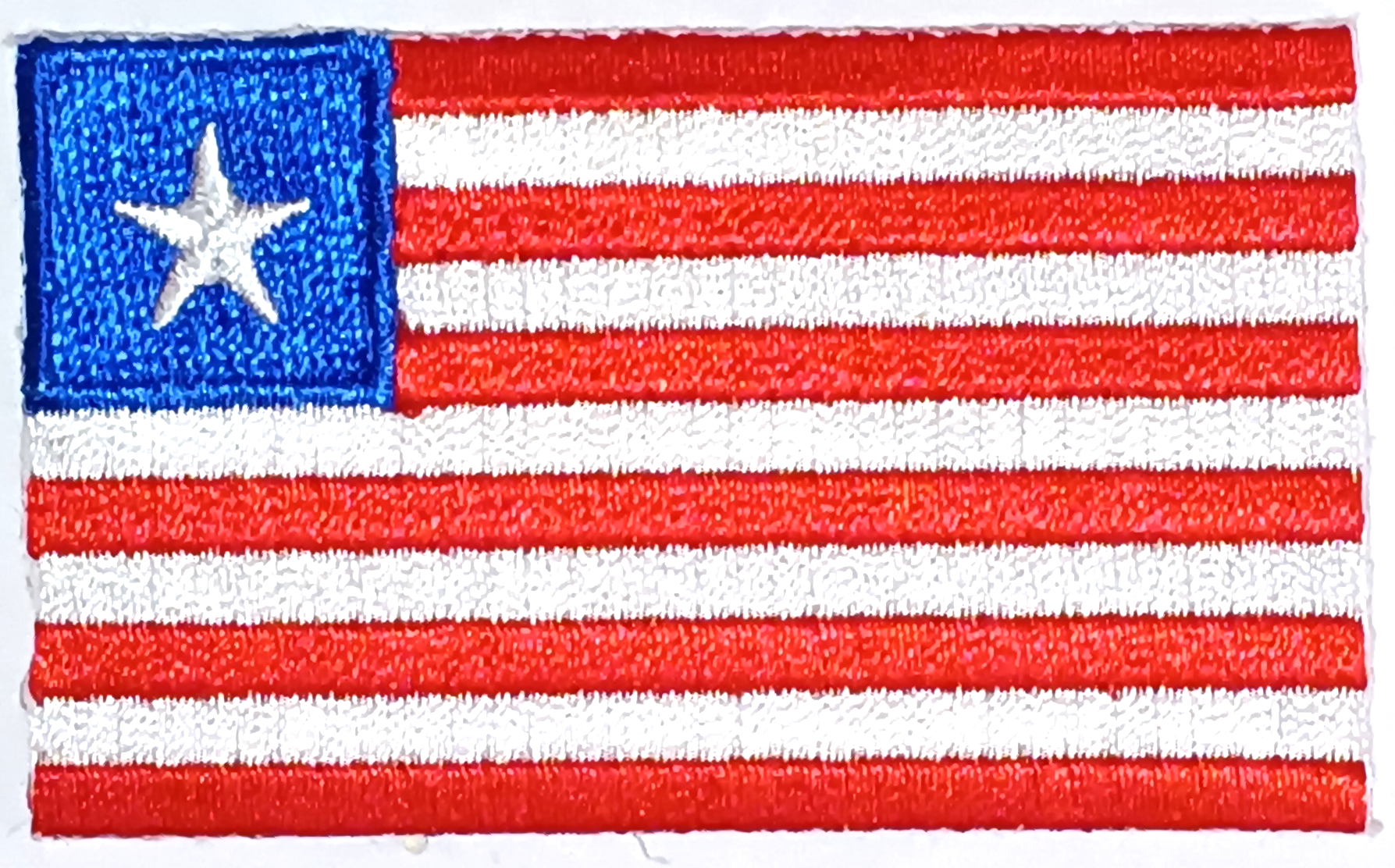 LIBERIA TYGMÄRKE 65X38mm