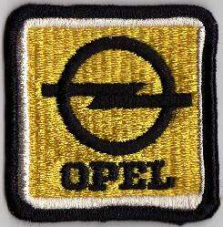 OPEL TYGMÄRKE 67x67mm