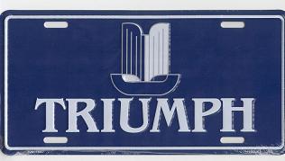 TRIUMPH PLÅTSKYLT 30x15cm