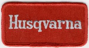 HUSQVARNA TYGMÄRKE 99x52mm