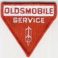 OLDSMOBILE SERVICE TYGMÄRKE 67x65mm