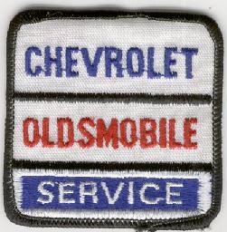 CHEVROLET-OLDSMOBILE TYGMÄRKE 67x67mm