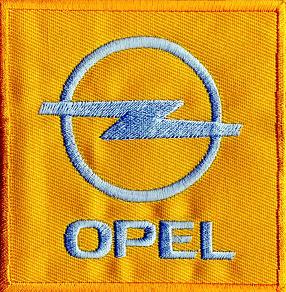 OPEL TYGMÄRKE 82X82mm