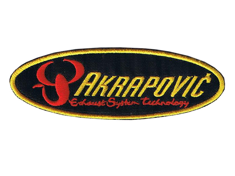 AKRAPOVIC TYGMÄRKE 125x42mm