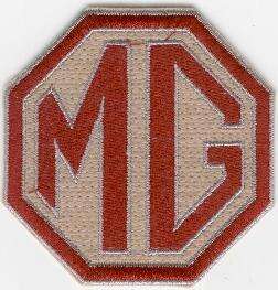 MG TYGMÄRKE 85x83mm