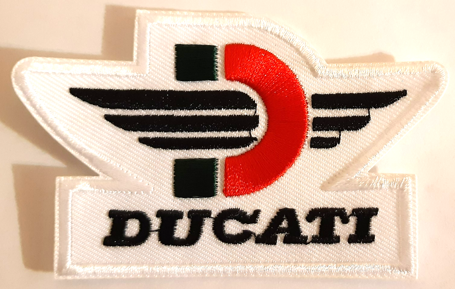 DUCATI TYGMÄRKE 90X55mm