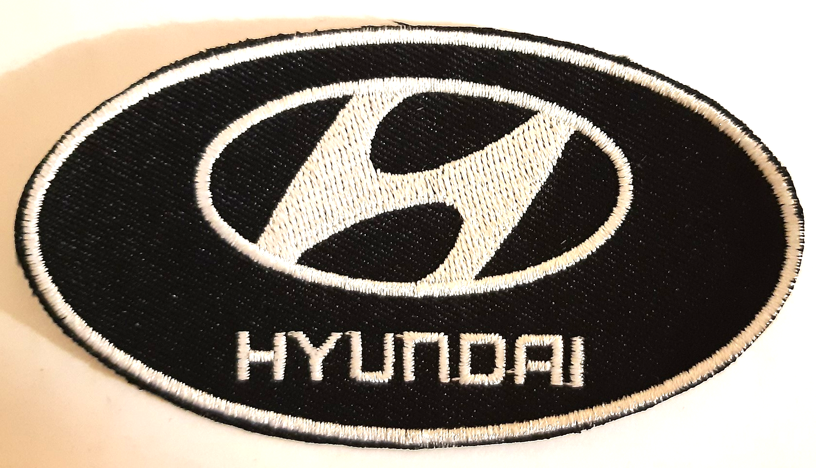 HYUNDAI TYGMÄRKE 101x56mm