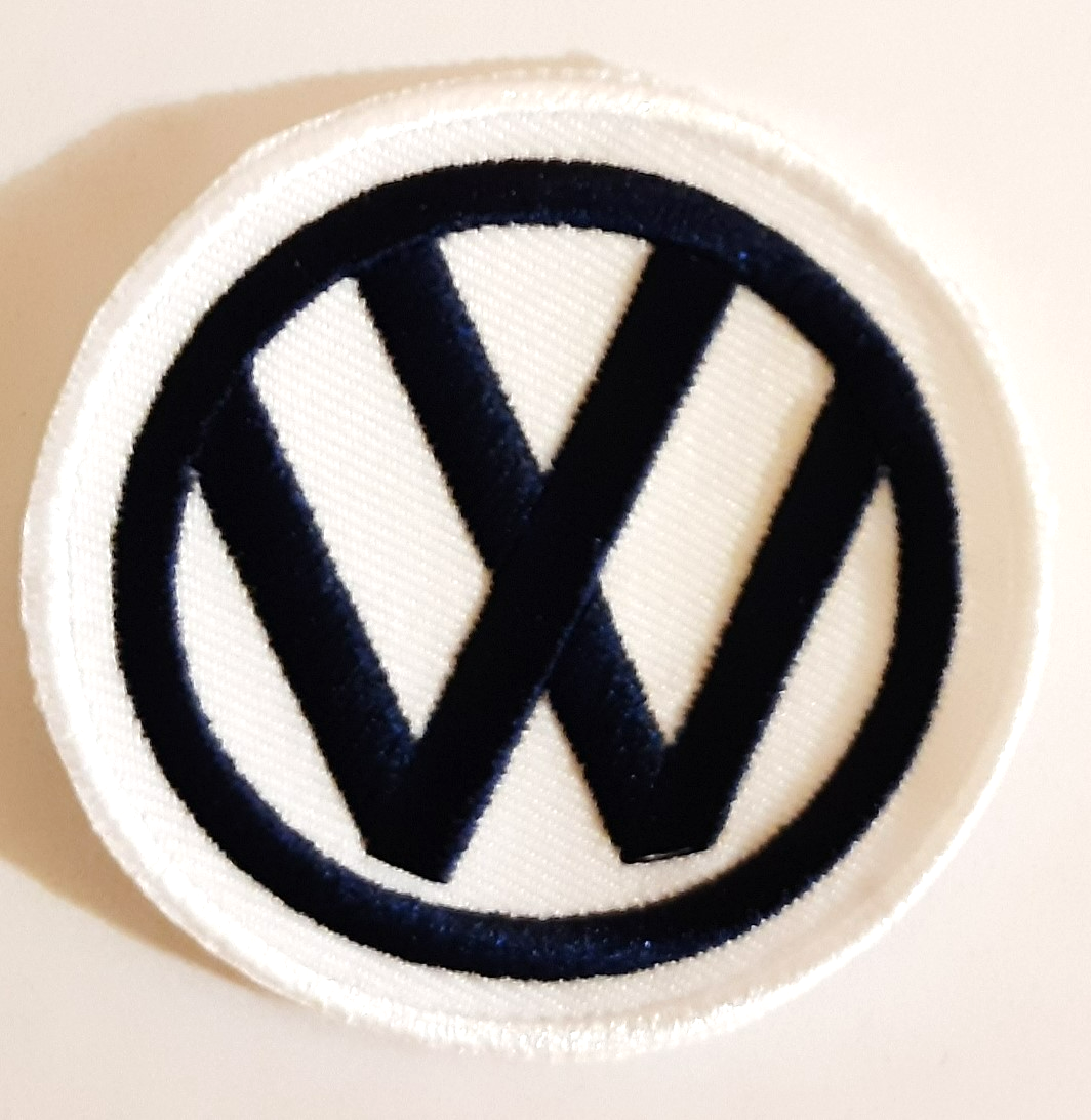 VW TYGMÄRKE 64mm